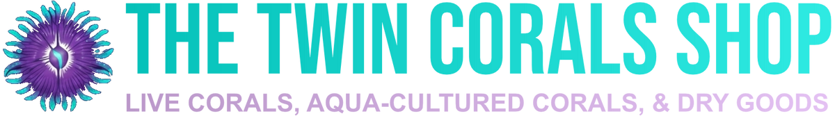 A logo-style graphic on a white background with a purple and turquoise anemone icon and the text 'THE TWIN CORALS SHOP' in bright turquoise, plus smaller pink text reading 'LIVE CORALS, AQUA-CULTURED CORALS, & DRY GOODS'.
